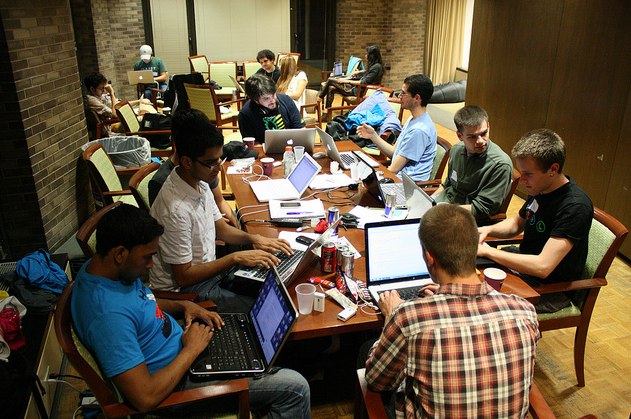 Participants on their laptops, in hackNY hackathon