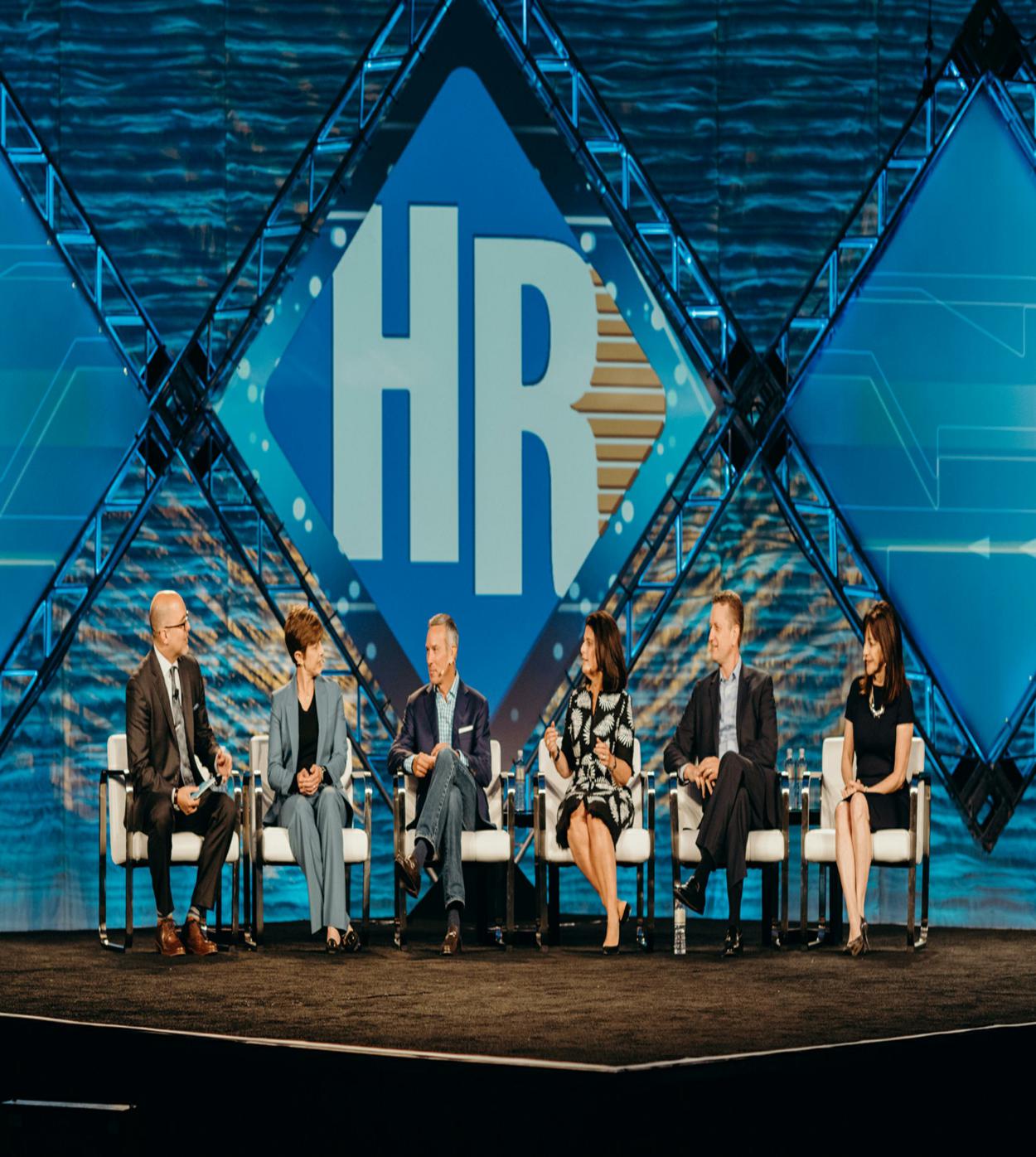 Speakers on stage at HR Tech Conference